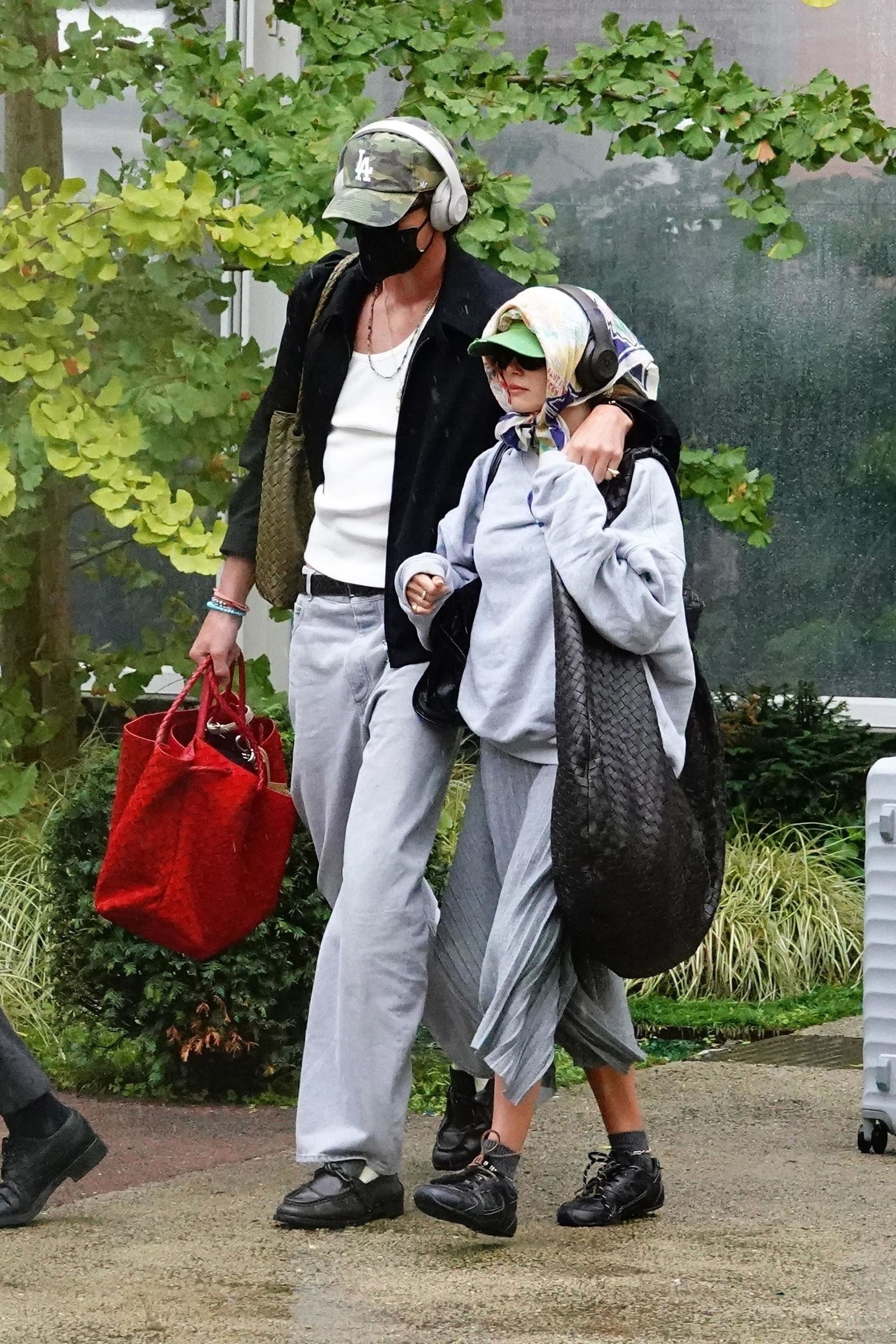 Image may contain Clothing Footwear Shoe Accessories Bag Handbag Jewelry Necklace Belt Adult and Person