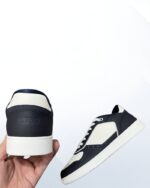 Dior B27 Sneaker in navy and white grained calfskin with Dior Oblique embossed leather