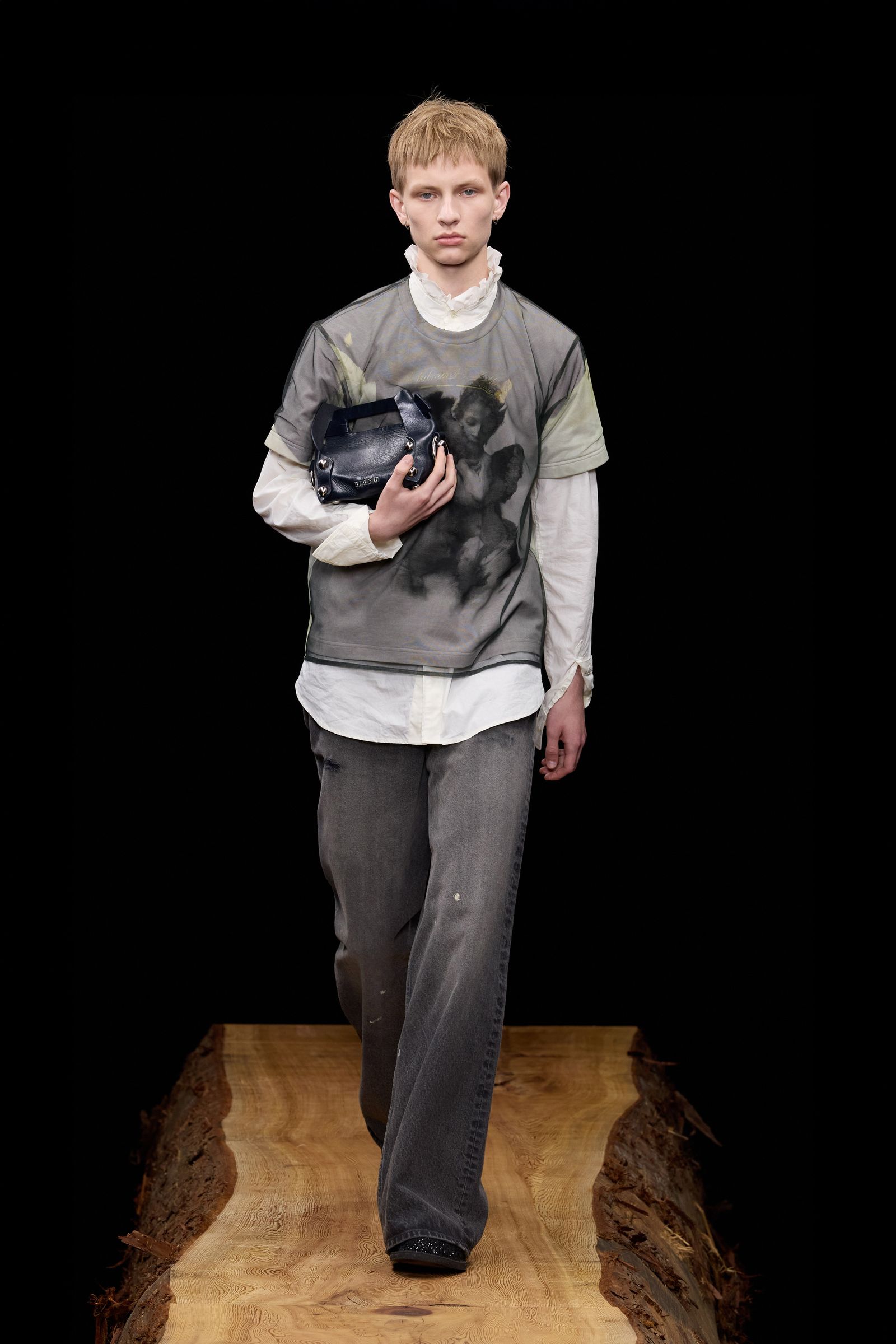 Image may contain Mathieu Spinosi Photography Clothing Pants Face Head Person Portrait TShirt Standing and Sleeve