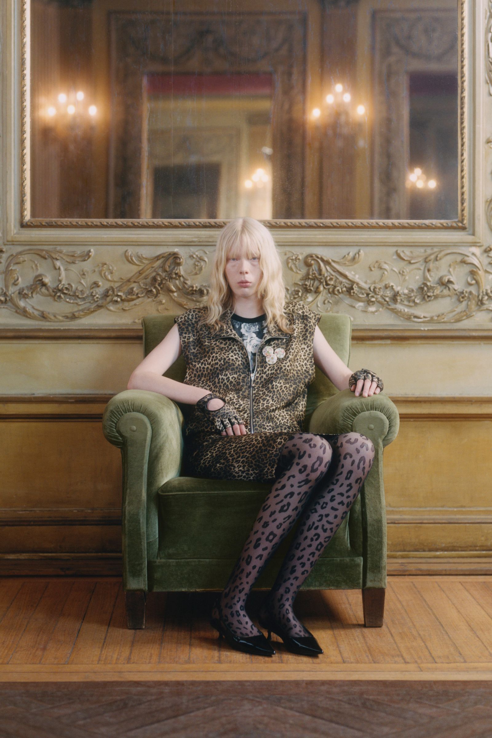 Image may contain Amy Carter Person Chair Furniture Adult Clothing Footwear High Heel Shoe Wristwatch and Sitting