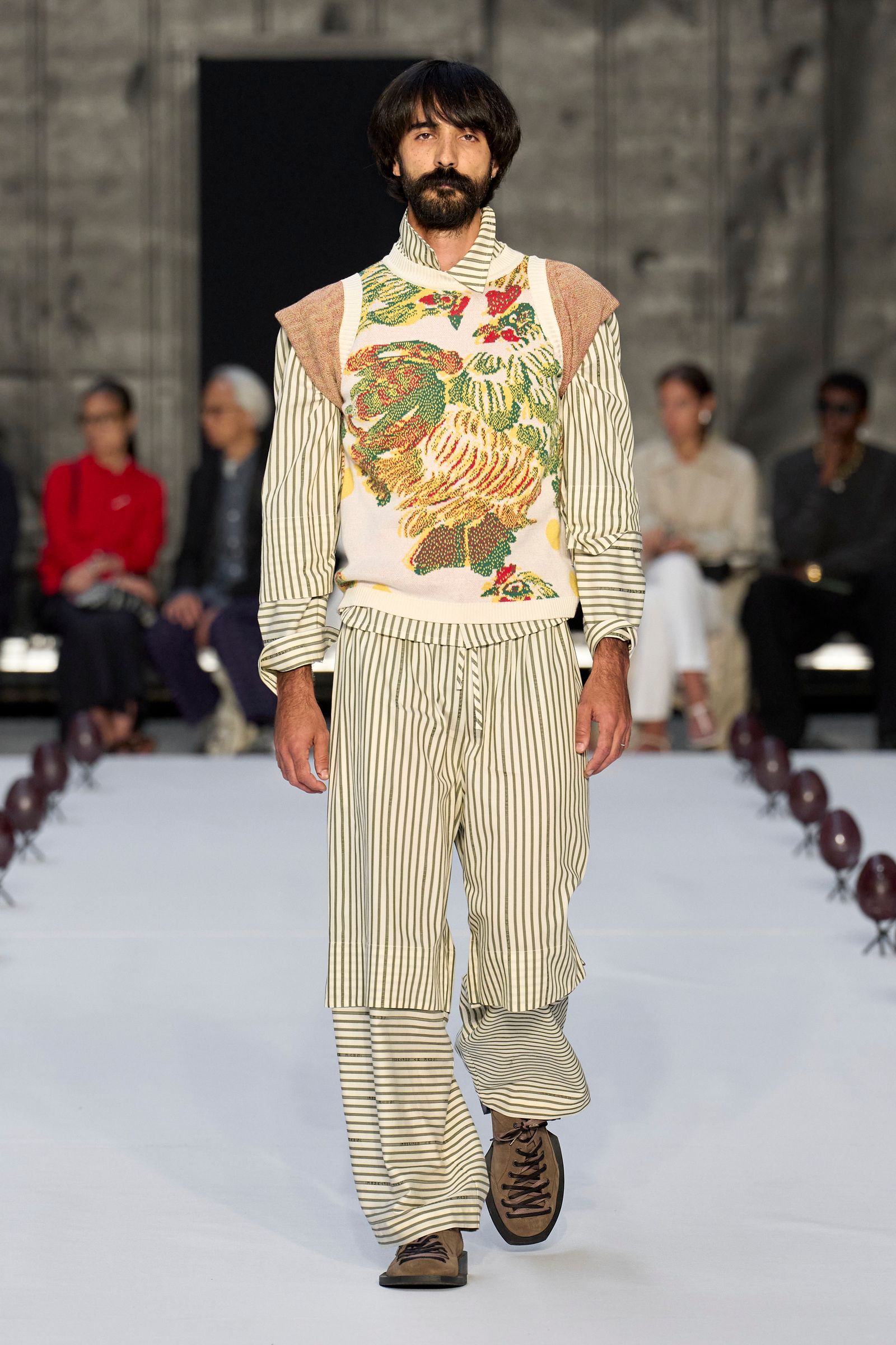 Image may contain Matthew the Apostle Fashion Adult Person Clothing Footwear Shoe Standing Pants and Accessories