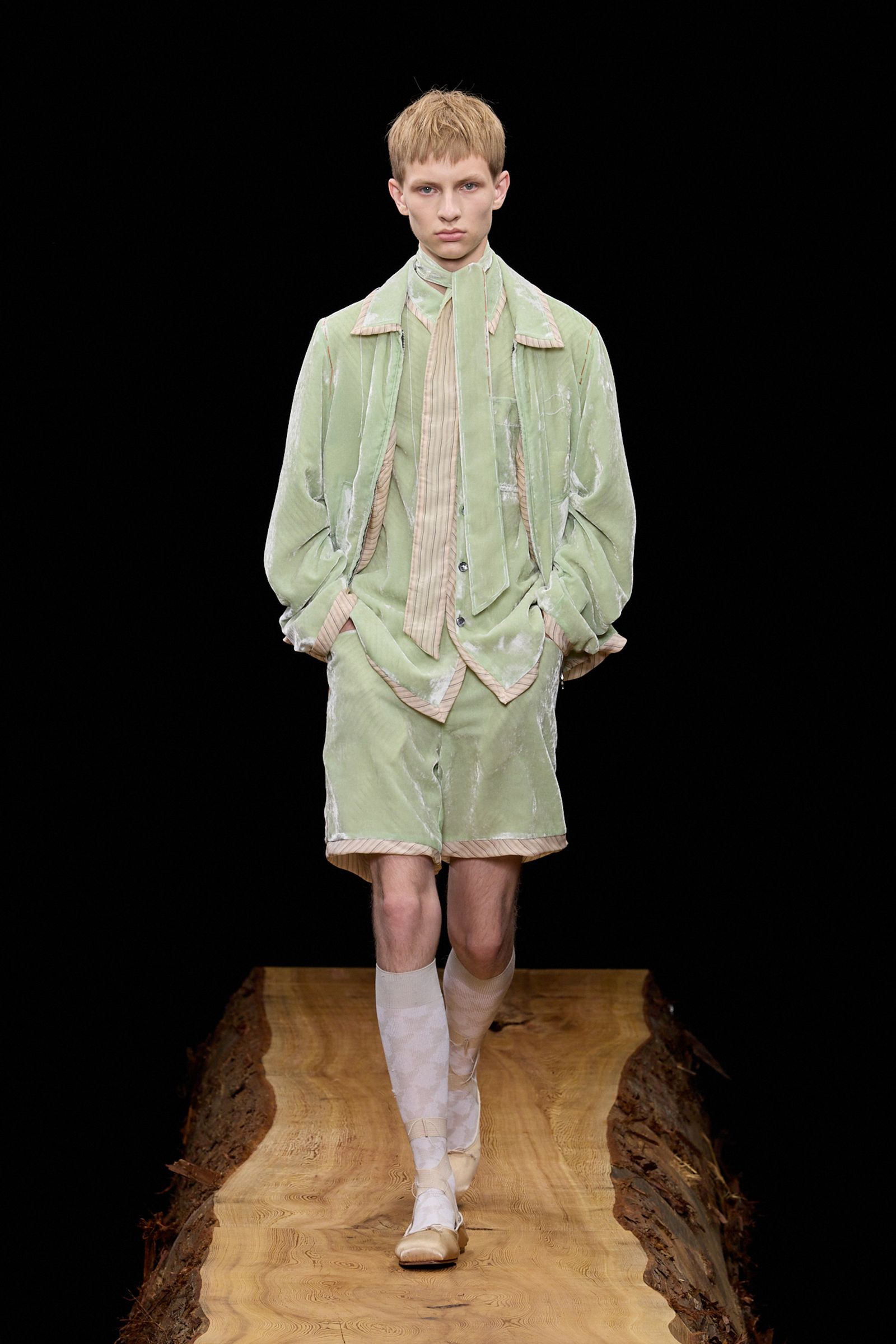 Image may contain Clothing Coat Fashion Person Teen Long Sleeve Sleeve and Overcoat