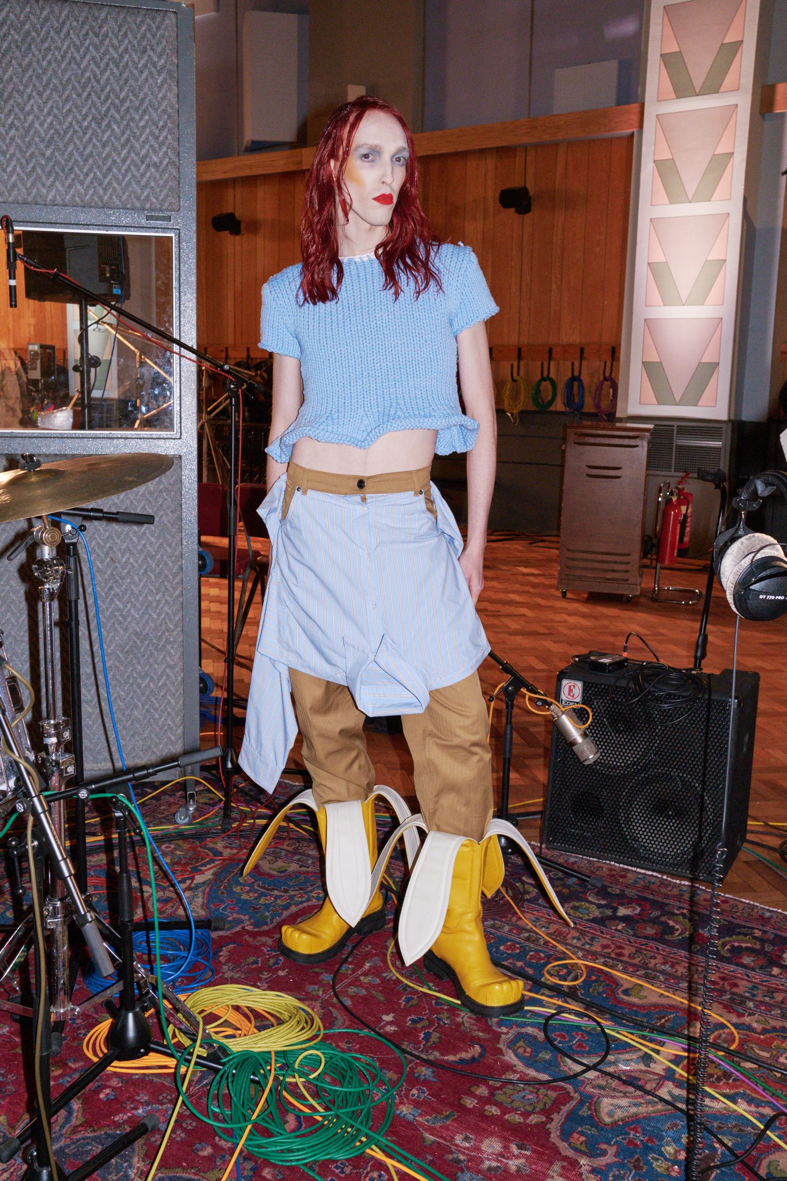 Image may contain Alexi Laiho Electronics Speaker Clothing Footwear Shoe Person Teen and Electrical Device