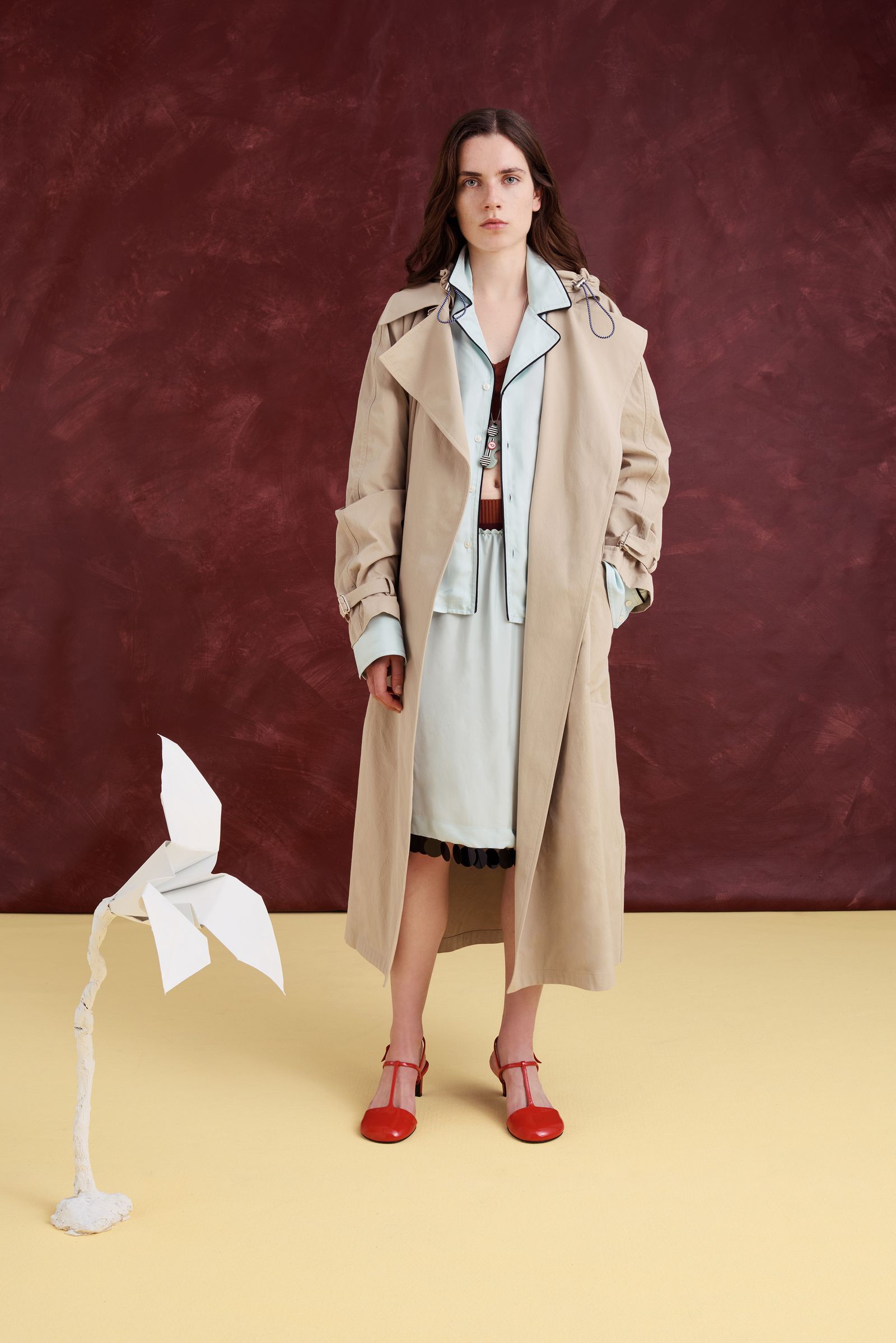 Image may contain Yuliya Snigir Clothing Coat Overcoat Adult Person Trench Coat Footwear High Heel and Shoe