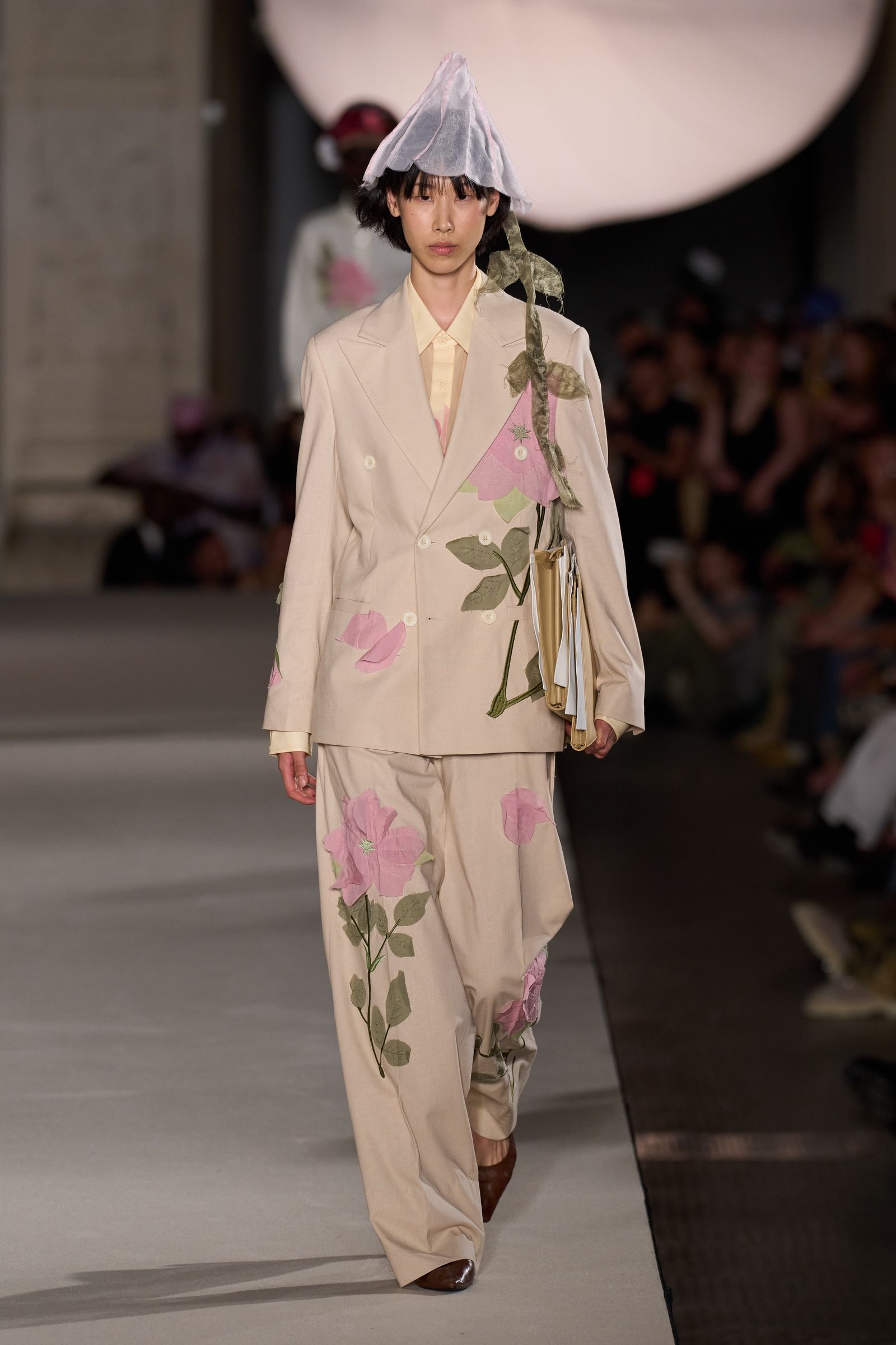 Image may contain Vivian Bang Fashion Adult Person Formal Wear Clothing Coat Suit Accessories Tie and Footwear