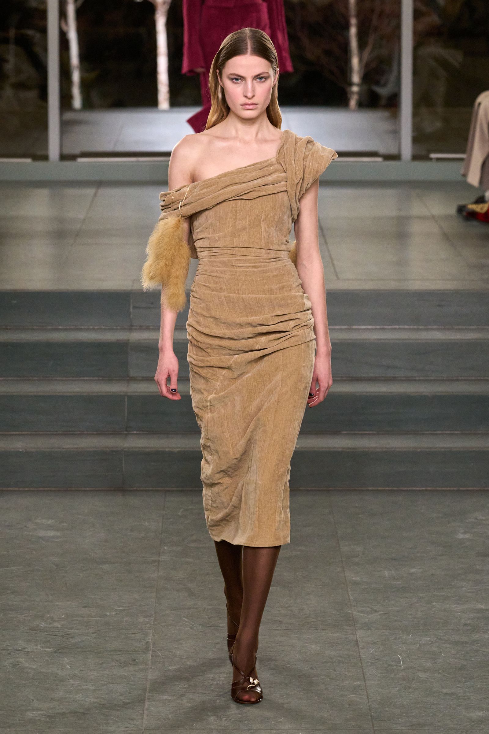 Image may contain Fashion Adult Person Clothing Dress Formal Wear and Runway