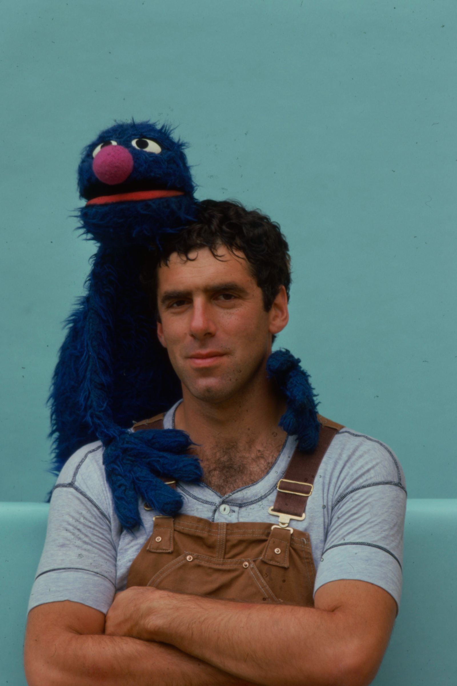 Image may contain Elliott Gould Adult Person Clothing Glove Face Head Photography Portrait and Hair