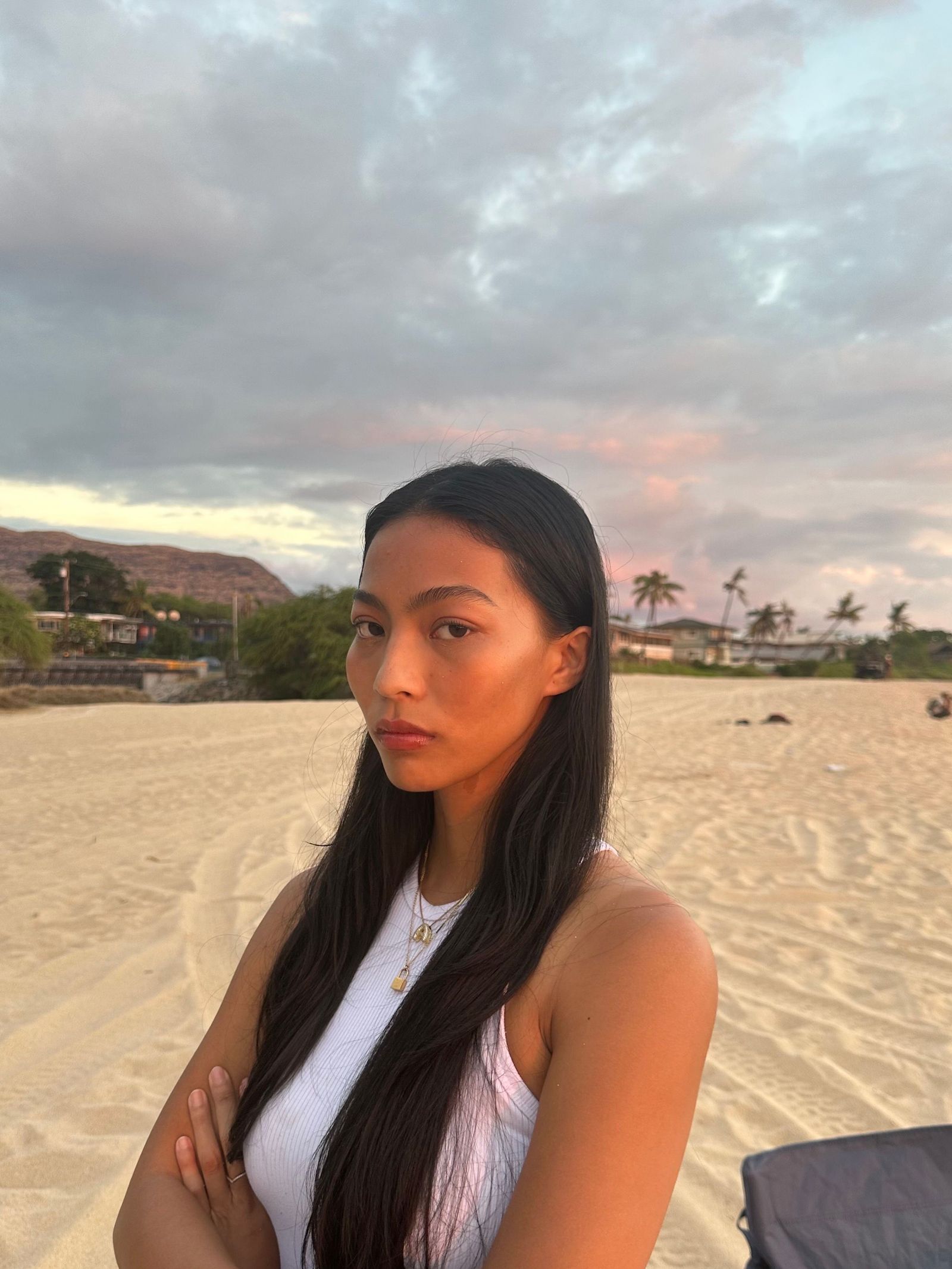 Image may contain Black Hair Hair Person Face Head Photography Portrait Teen Body Part and Neck