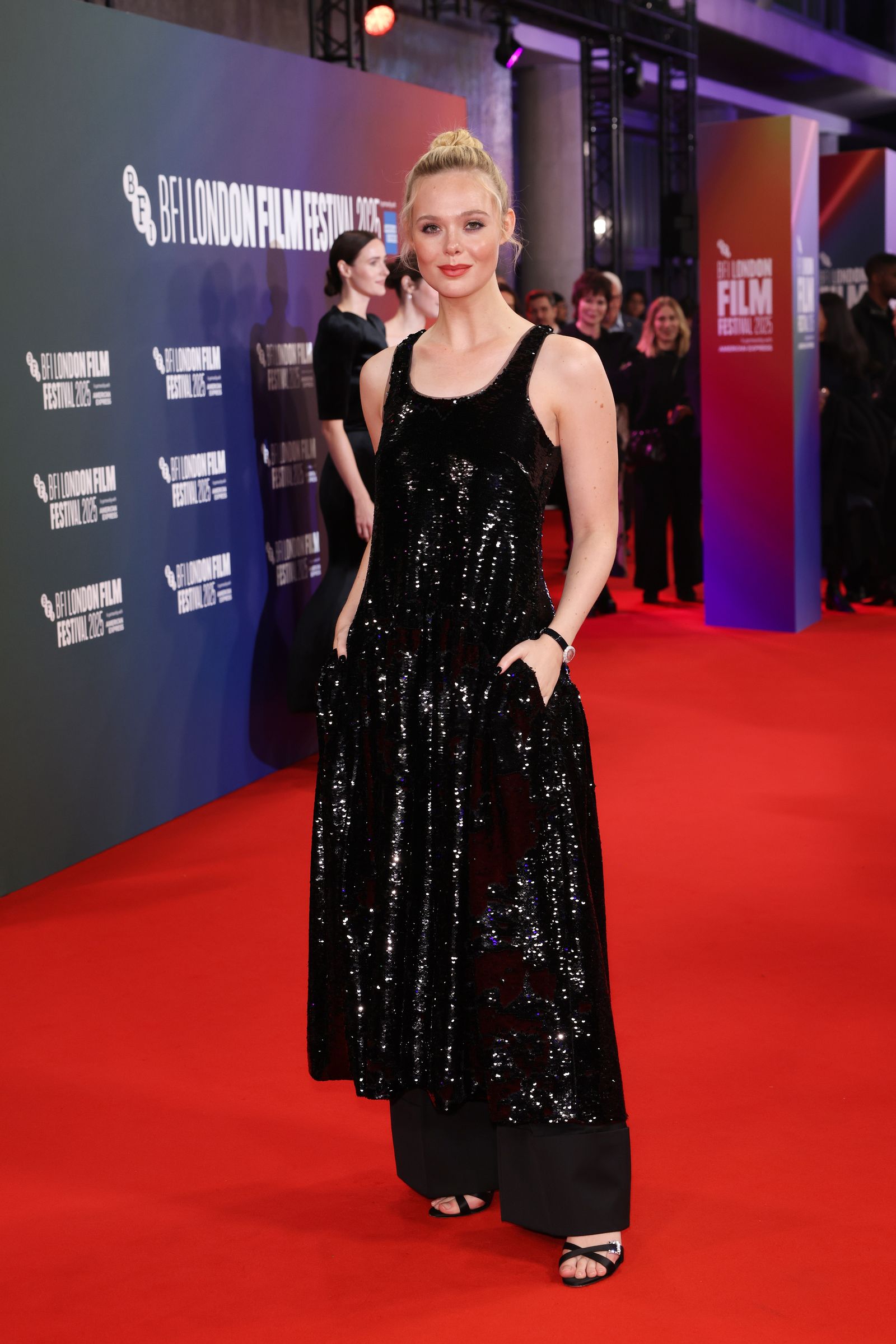 Image may contain Elle Fanning Rachel Brosnahan Carrie Perrodo Fashion Adult Person Premiere and Red Carpet